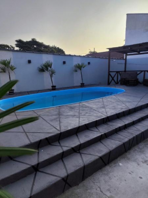Casa na praia com piscina